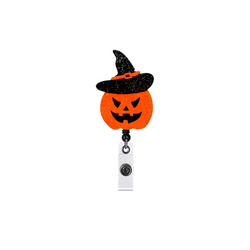 Pumpkin with Witch Hat Badge Reel    2 3/4" X 2"